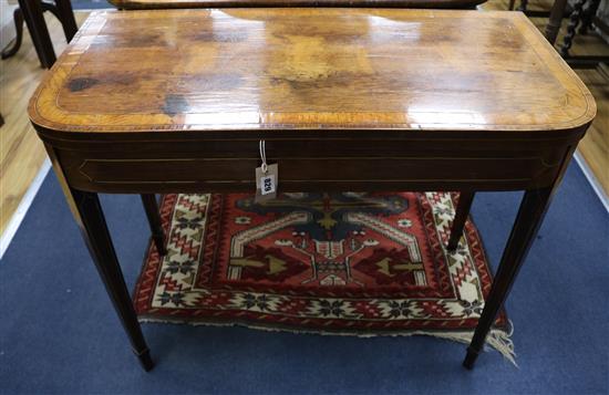 A Regency rosewood card table, with brass inset legs, W.92cm